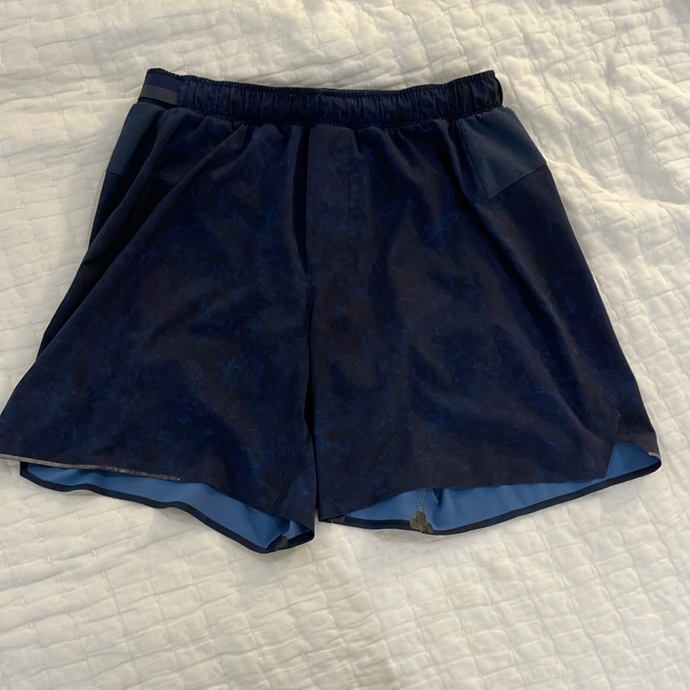 It is a lululemon dark blue shorts, lined 7 and small